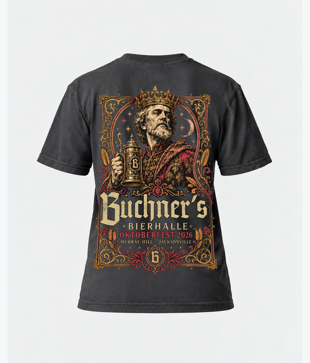 Back product view of the graphite Buchner's Bierhalle Oktoberfest 2026 commemorative T-shirt showing the full illustrated king, beer stein, and ornate festival graphic.