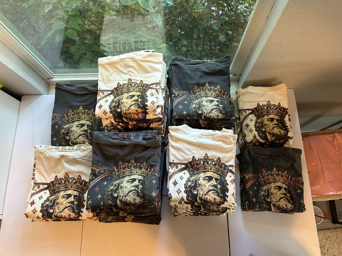 Finished Buchner's Oktoberfest 2026 shirts folded and ready for delivery