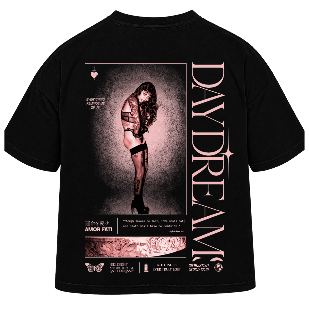 Black graphic t-shirt shown from the back, featuring a large pink and white print with a woman in lingerie, the text 'DAYDREAM' vertically, and 'AMOR FATI' at the bottom.
